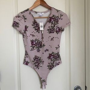 Floral bodysuit with gold zipper accent